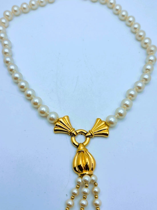 Vintage Creme-Perlenkette mit goldener Quaste