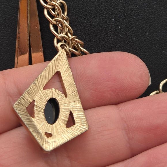 Gold Statement Necklace with Geometric Accents