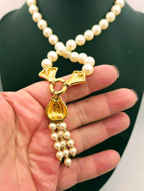 Vintage Creme-Perlenkette mit goldener Quaste