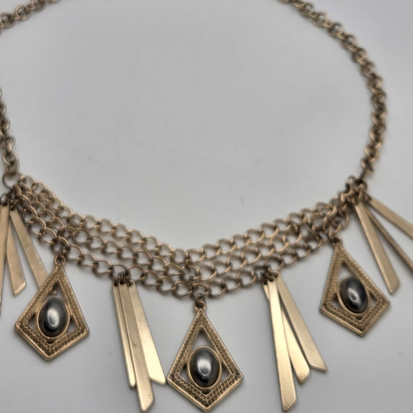 Gold Statement Necklace with Geometric Accents