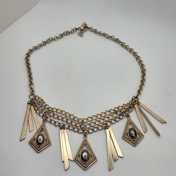 Gold Statement Necklace with Geometric Accents