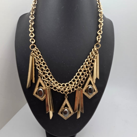 Gold Statement Necklace with Geometric Accents