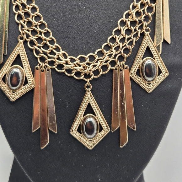 Gold Statement Necklace with Geometric Accents