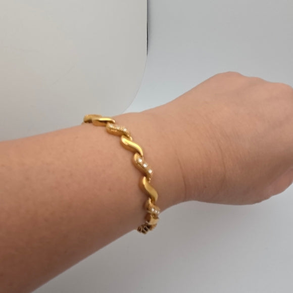 Vintage 1990s Avon Gold Tone Tennis Bracelet w/ Clear Rhinestones 7.5"