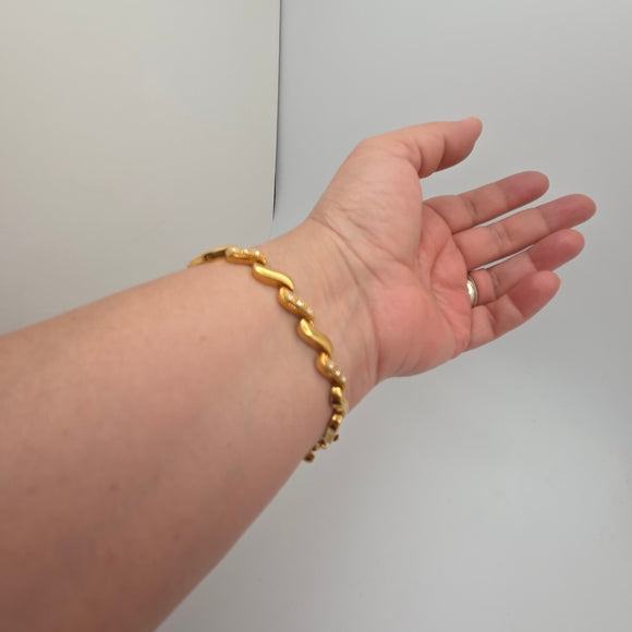 Vintage 1990s Avon Gold Tone Tennis Bracelet w/ Clear Rhinestones 7.5"